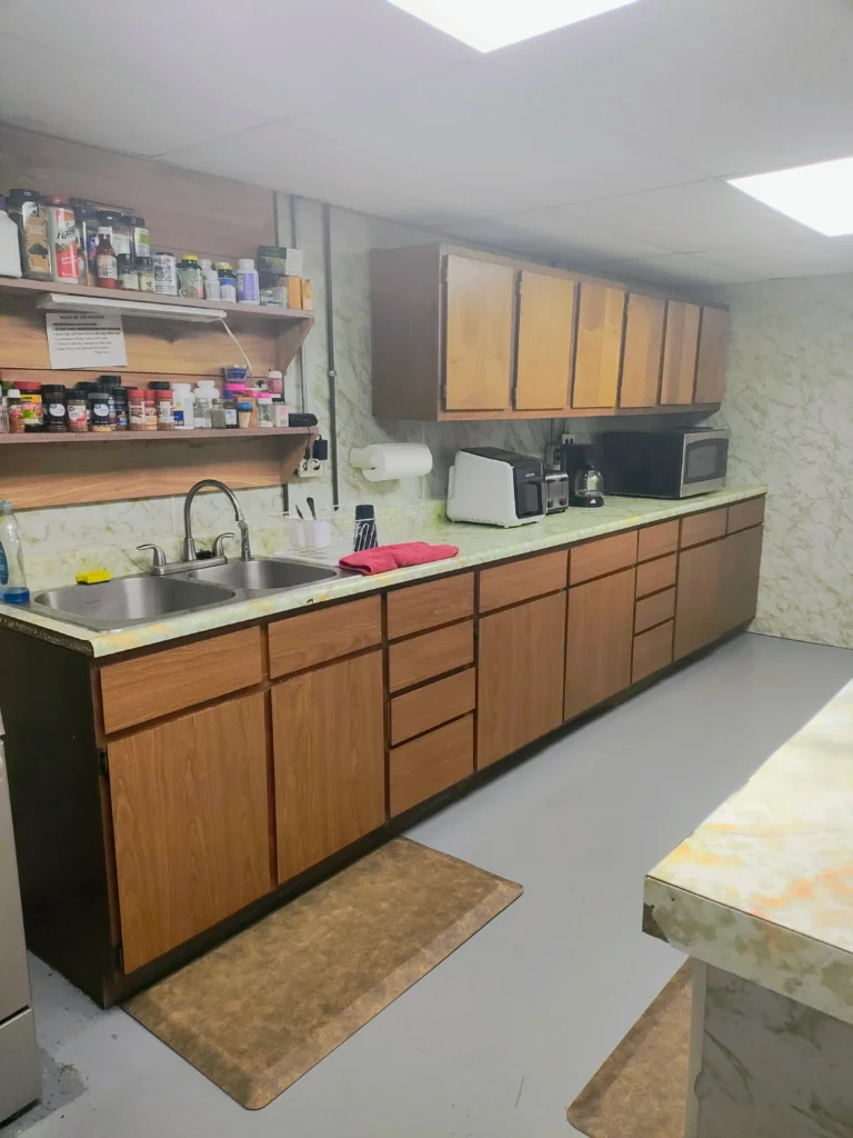 Program kitchen supporting daily meals and shared responsibility in a residential setting